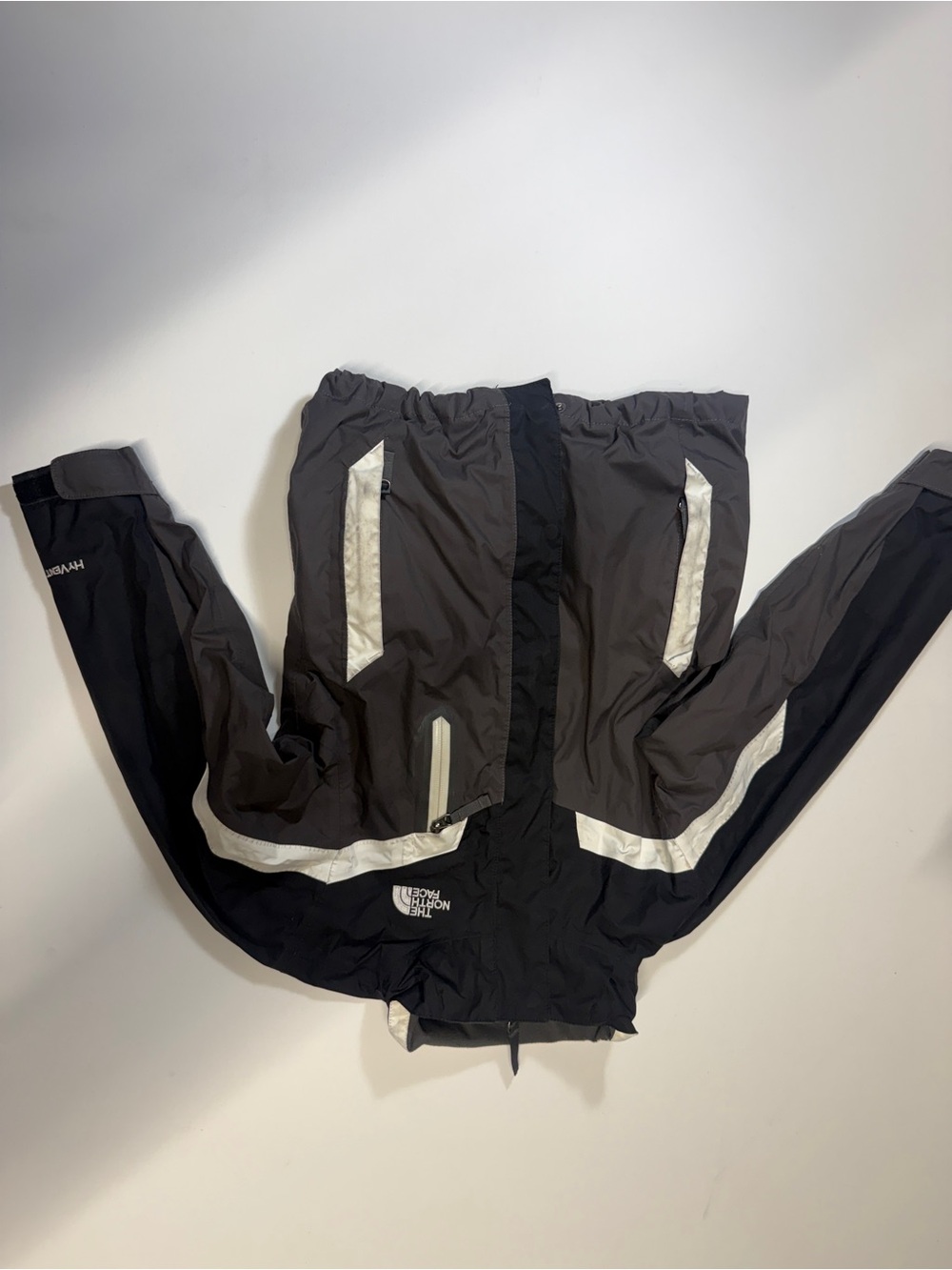 The North Face Black and Gray Windbreaker Jacket with Reflective Trim